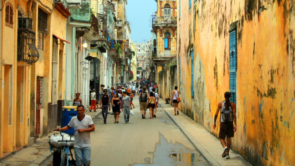 People Walking Down the Street in Havana, Cuba
